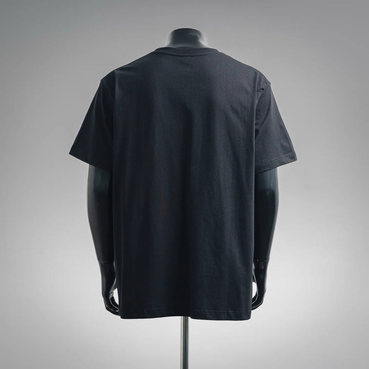 Black short-sleeve T-shirt back view on mannequin with crew neckline
