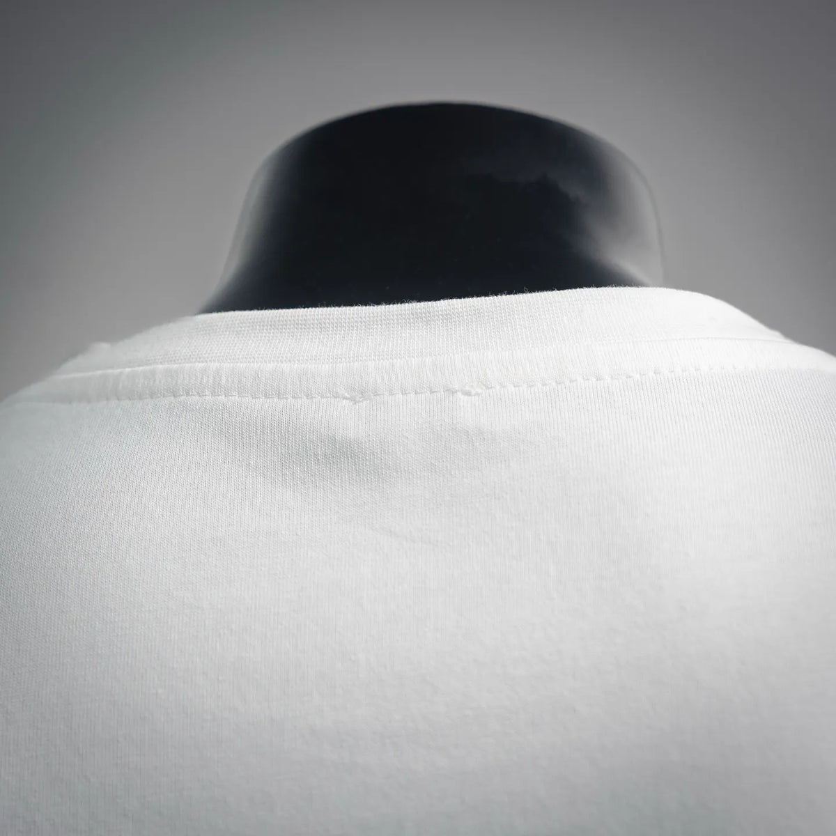 Close-up of LOEWE T-shirt collar and neckline seam
