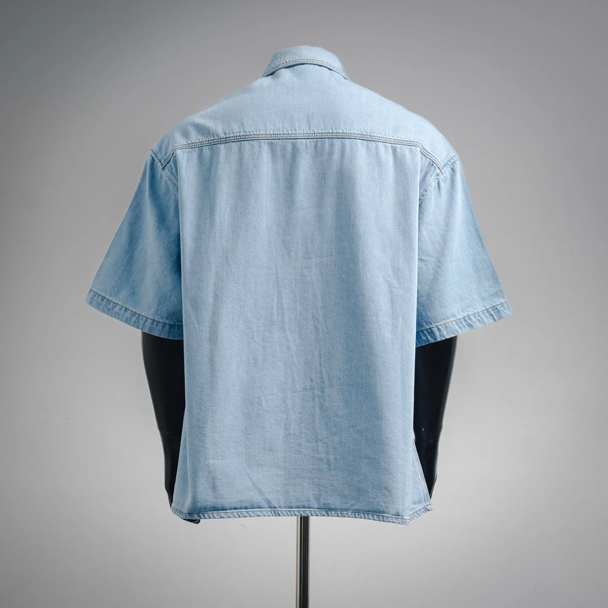 Light blue denim short-sleeve button shirt with plain back