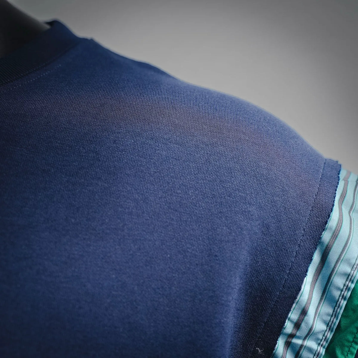 Dark navy T-shirt fabric and striped trim detail