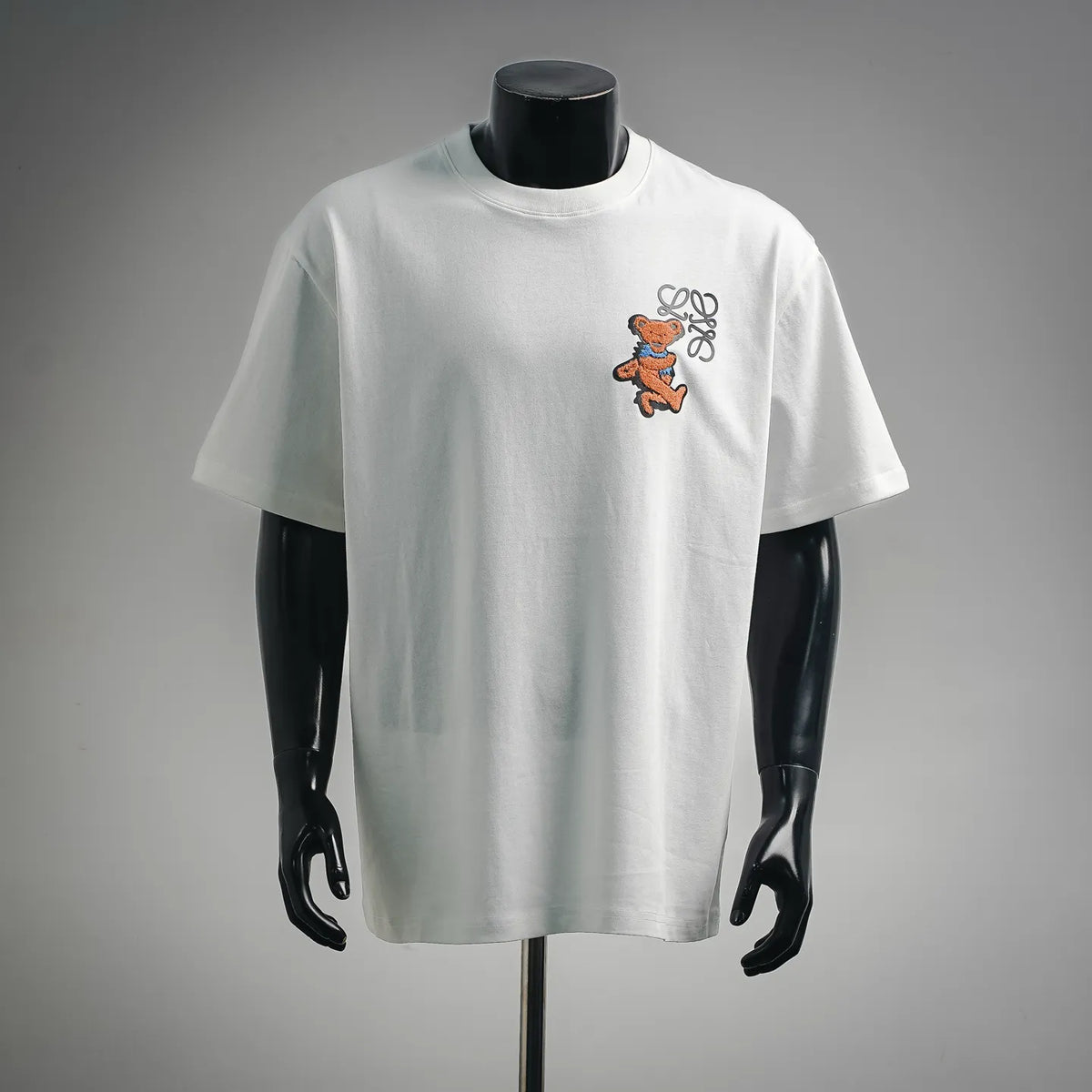 LOEWE white short-sleeve T-shirt with embroidered orange and blue cartoon bear graphic