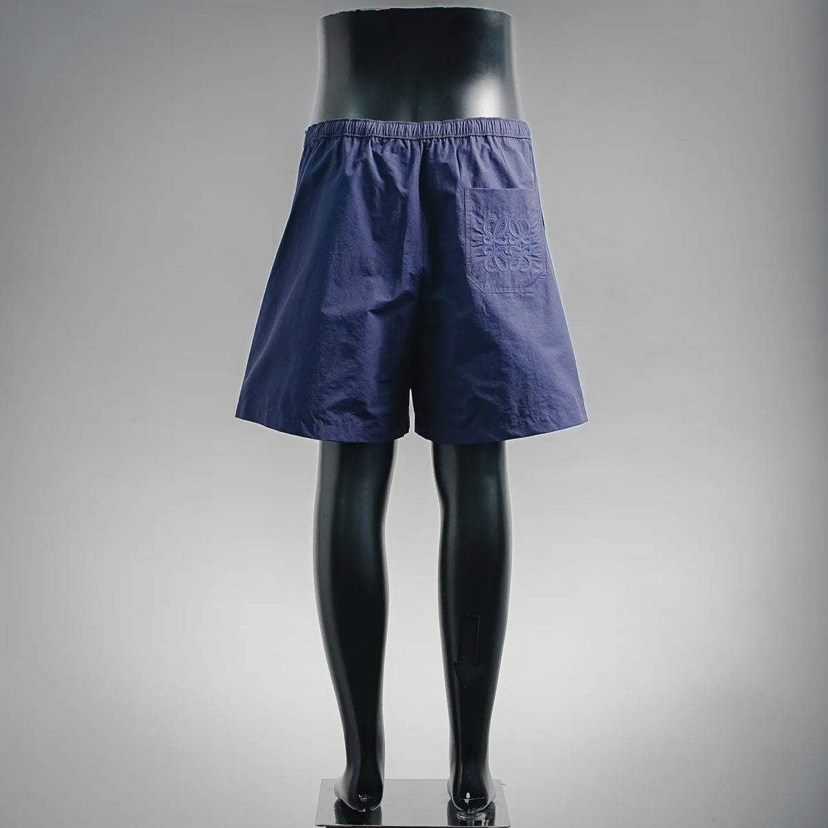 LOEWE navy shorts with elastic waistband and relaxed, wide legs