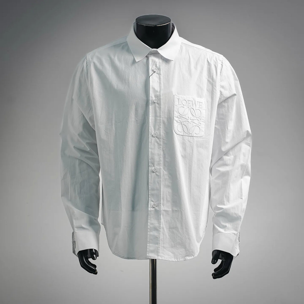 White LOEWE button-up shirt with embroidered chest logo patch