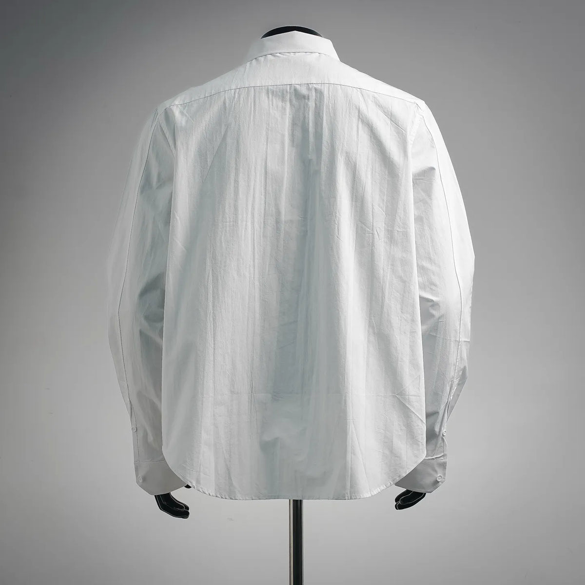 White LOEWE button-up shirt, back view with straight yoke seam