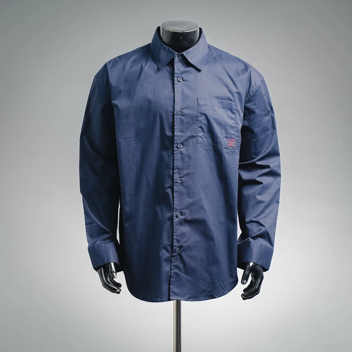 LOEWE long-sleeve shirt in blue with button front and chest patch