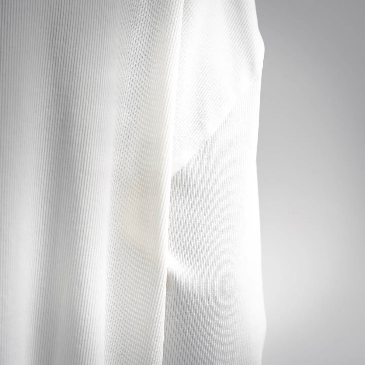 White LOEWE sweatshirt with textured rib knit and draped side panel