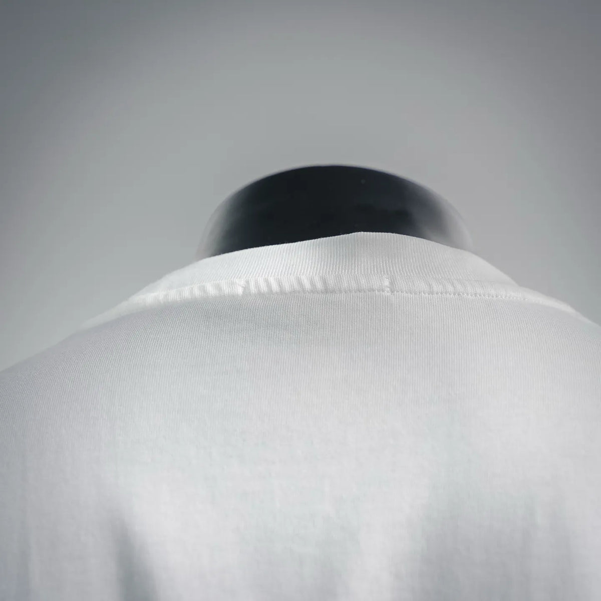 White T-shirt shoulder and back yoke seam