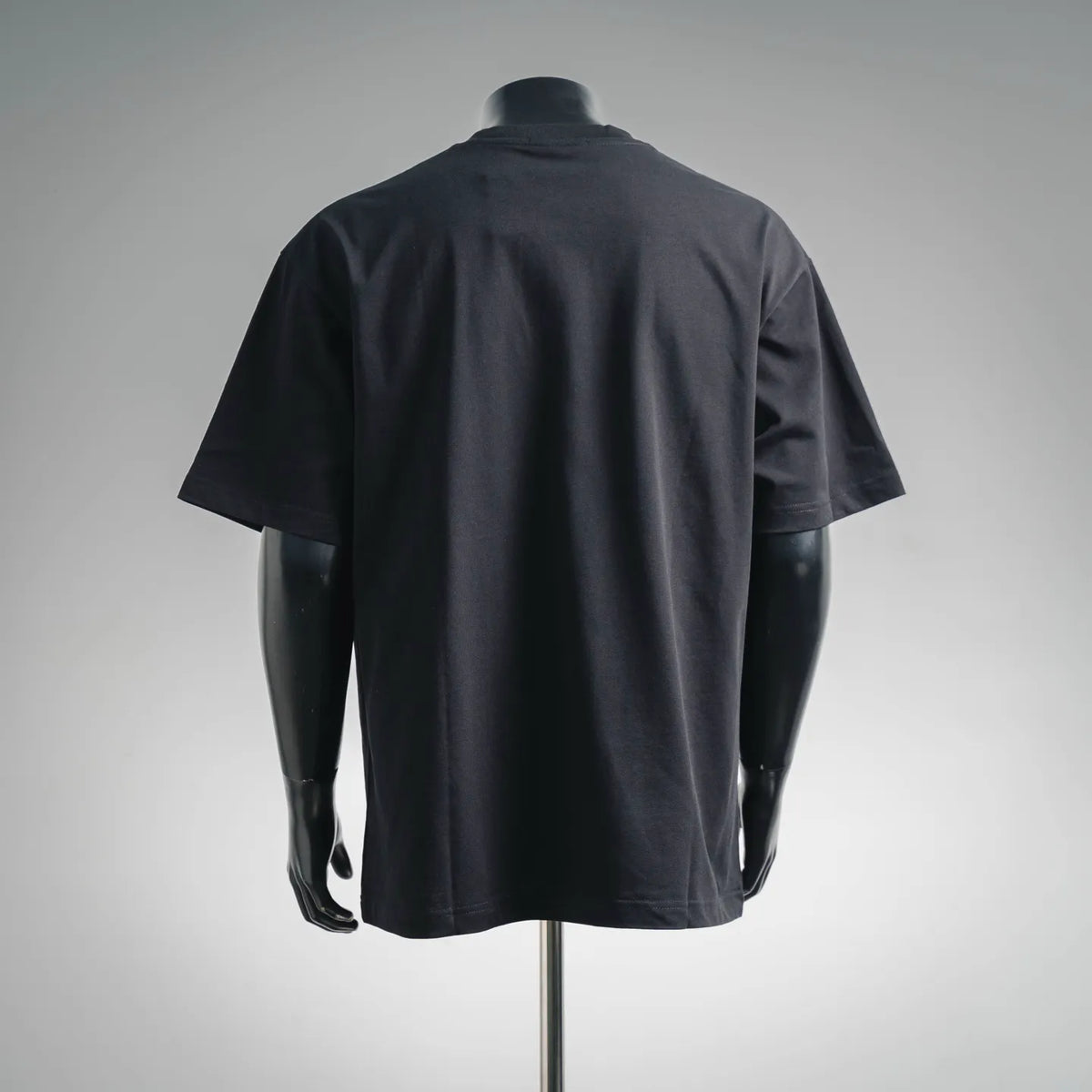 LOEWE graphic short-sleeve T-shirt in dark charcoal, back view on mannequin