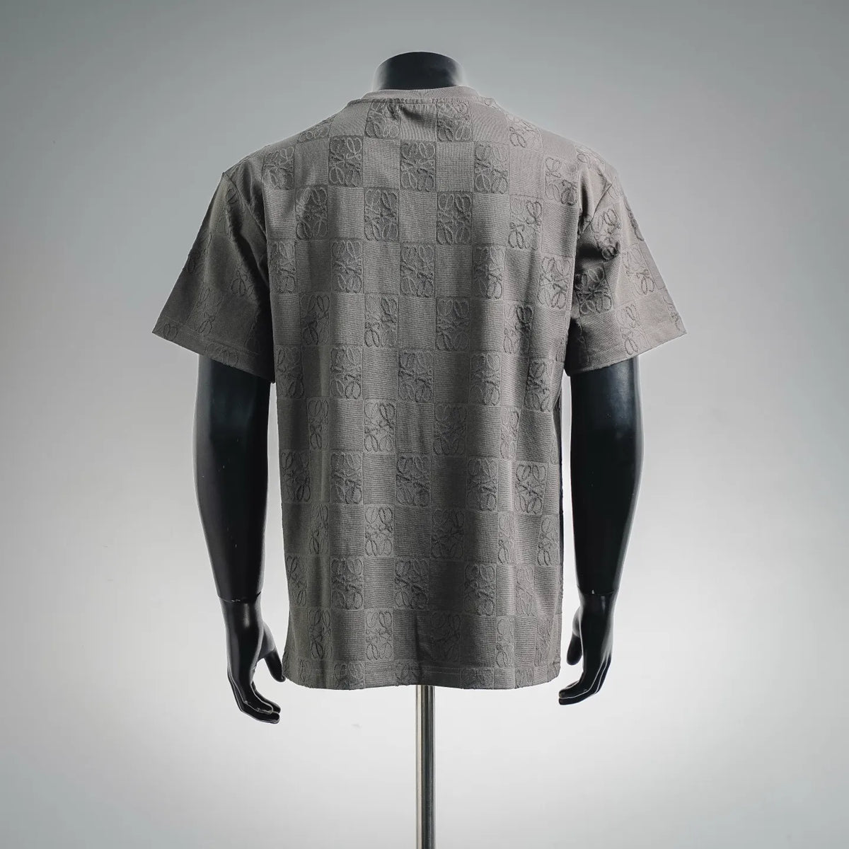 LOEWE short-sleeve T-shirt, back view, gray embossed monogram checkerboard