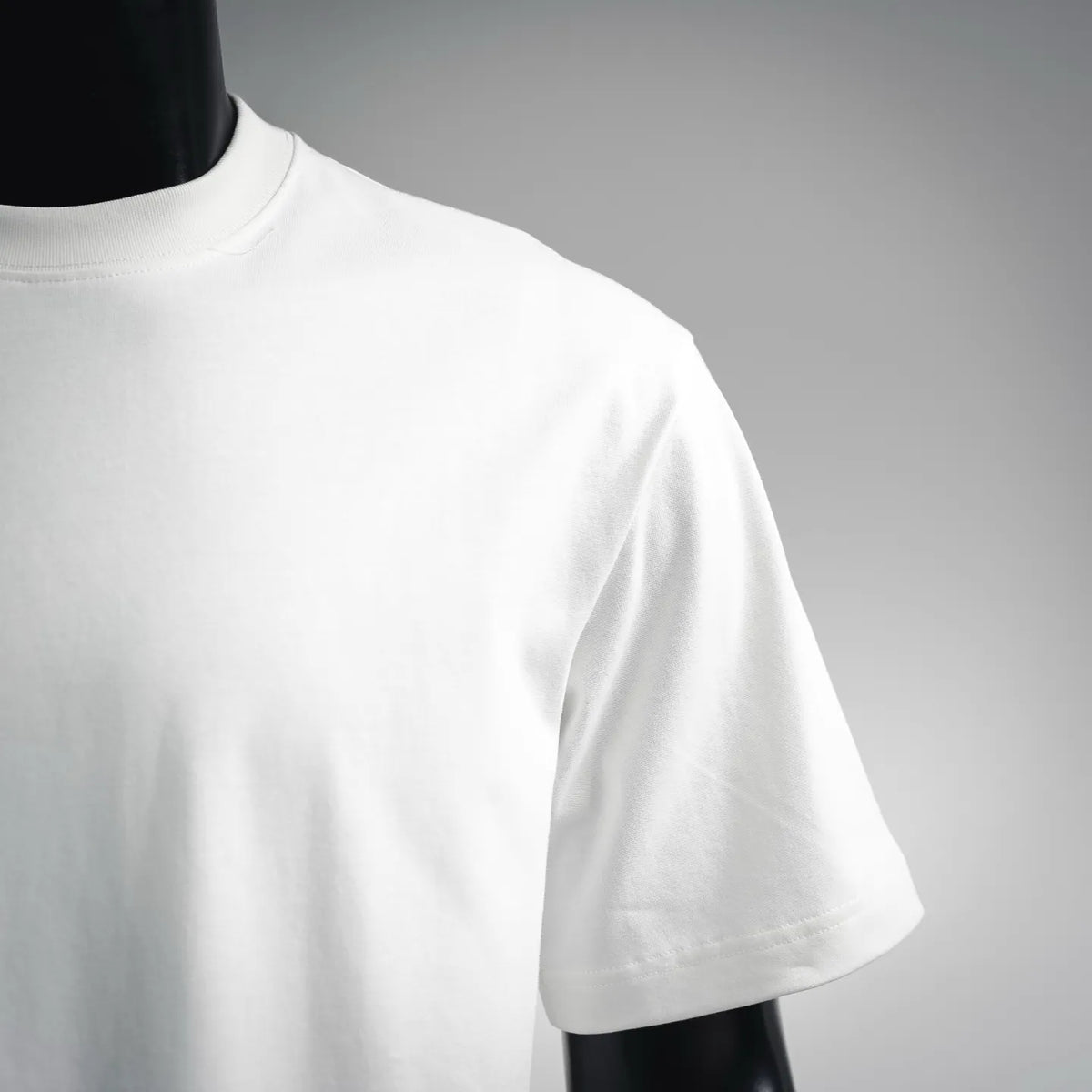 White LOEWE T-shirt side view on a mannequin, short sleeves, crew neck.