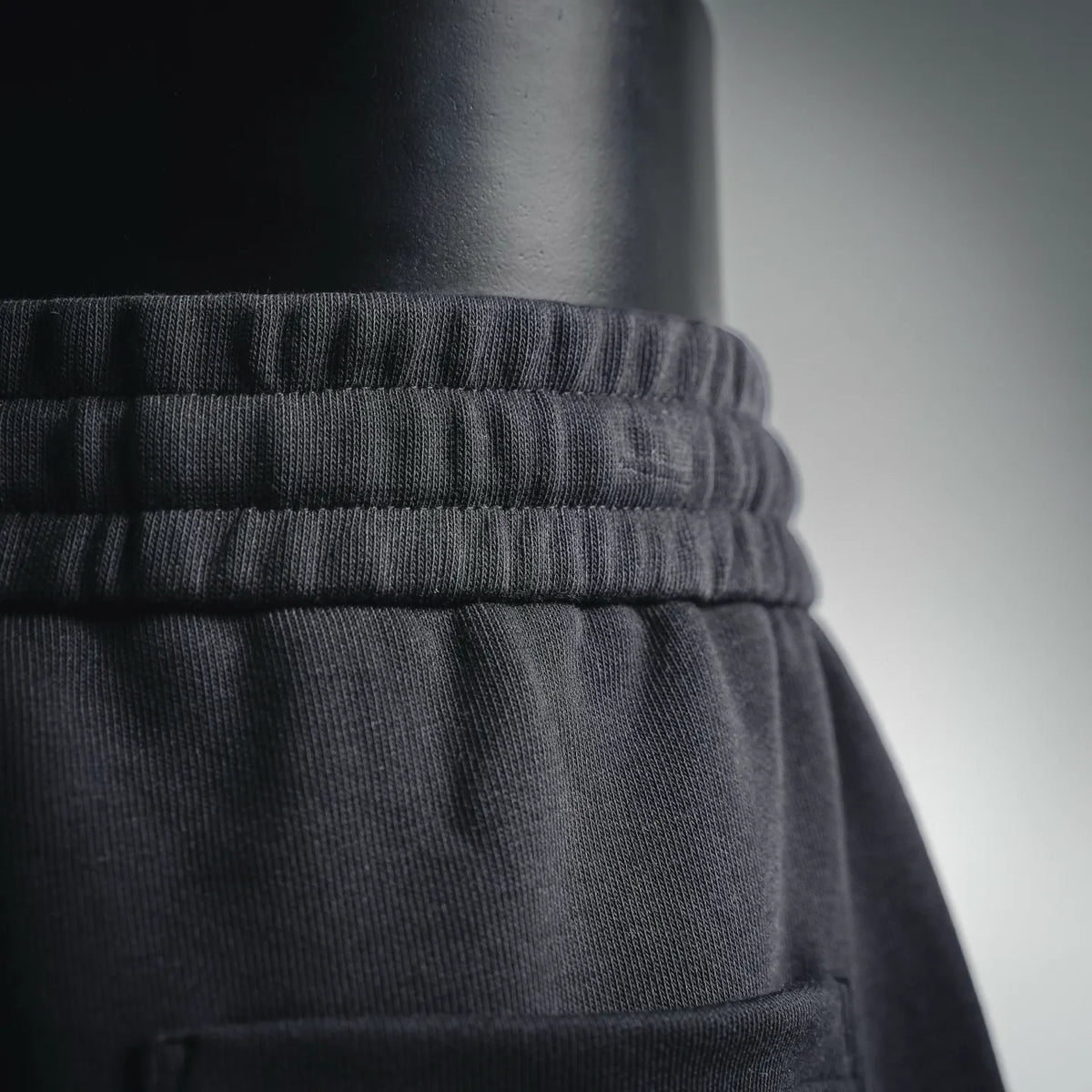 Black elastic waistband detail on knit shorts