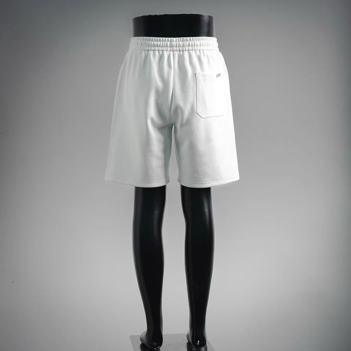 White LOEWE shorts with side welt pocket and elastic waistband
