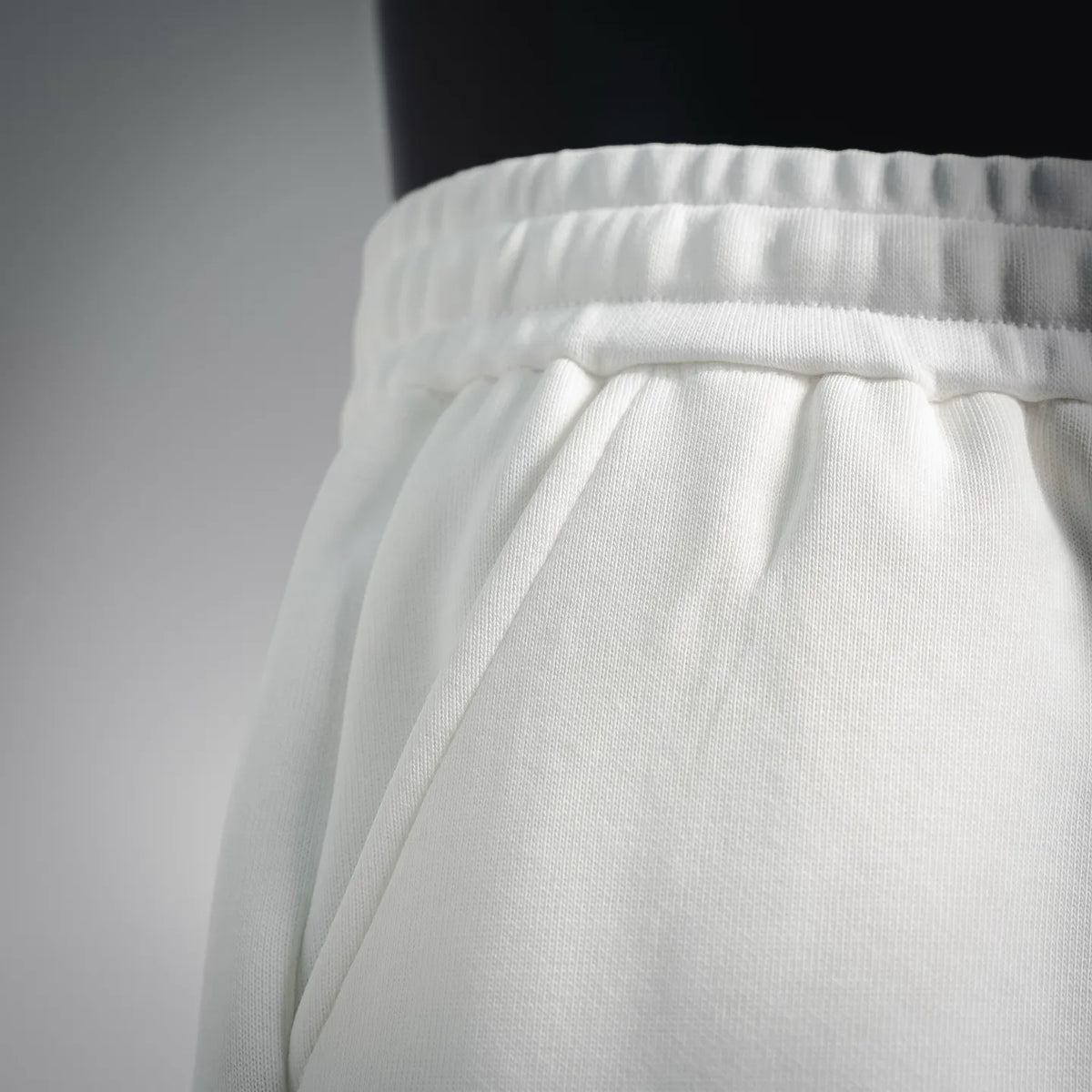 White shorts with front drawstring and gathered waistband