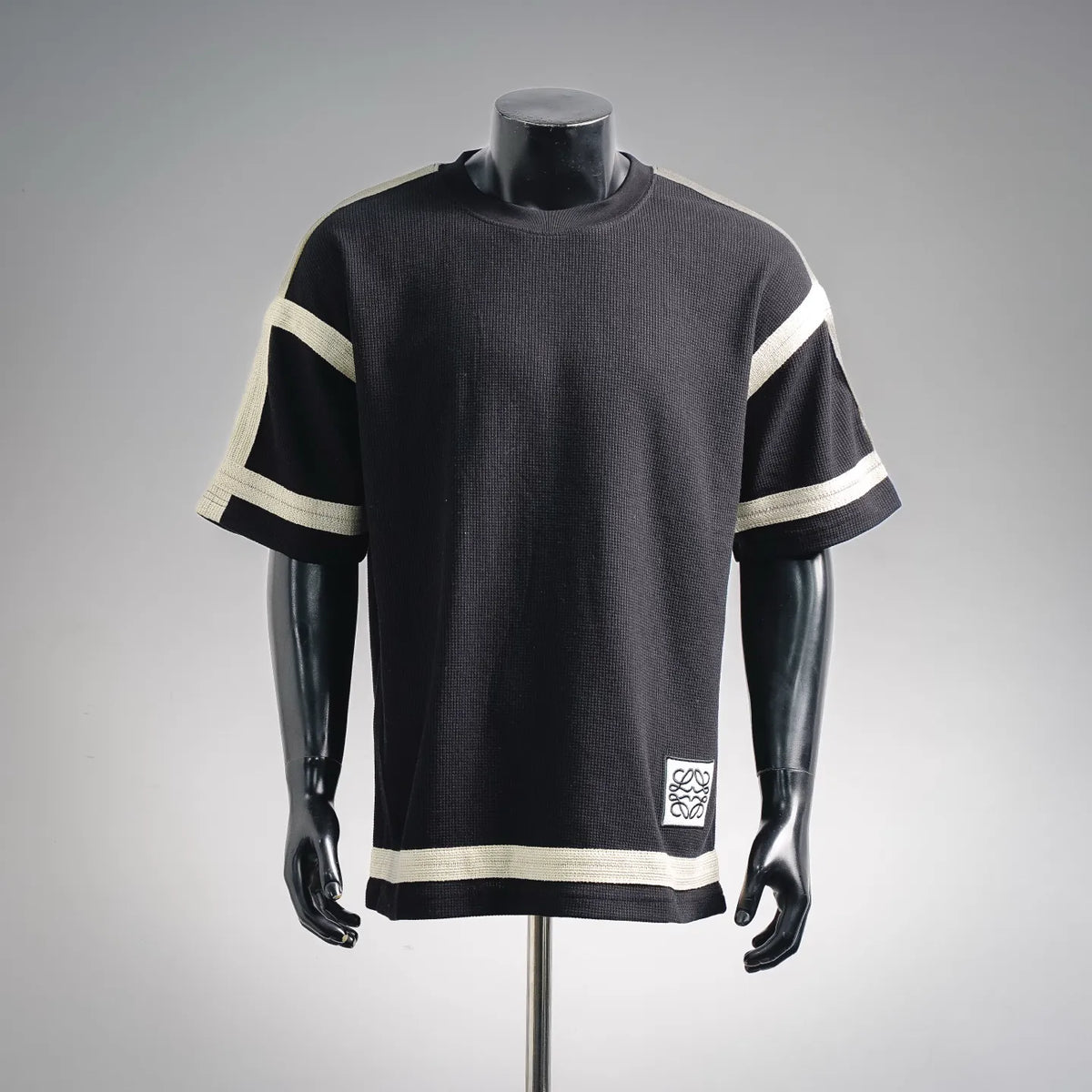 LOEWE black knit short-sleeve top with cream sleeve stripes