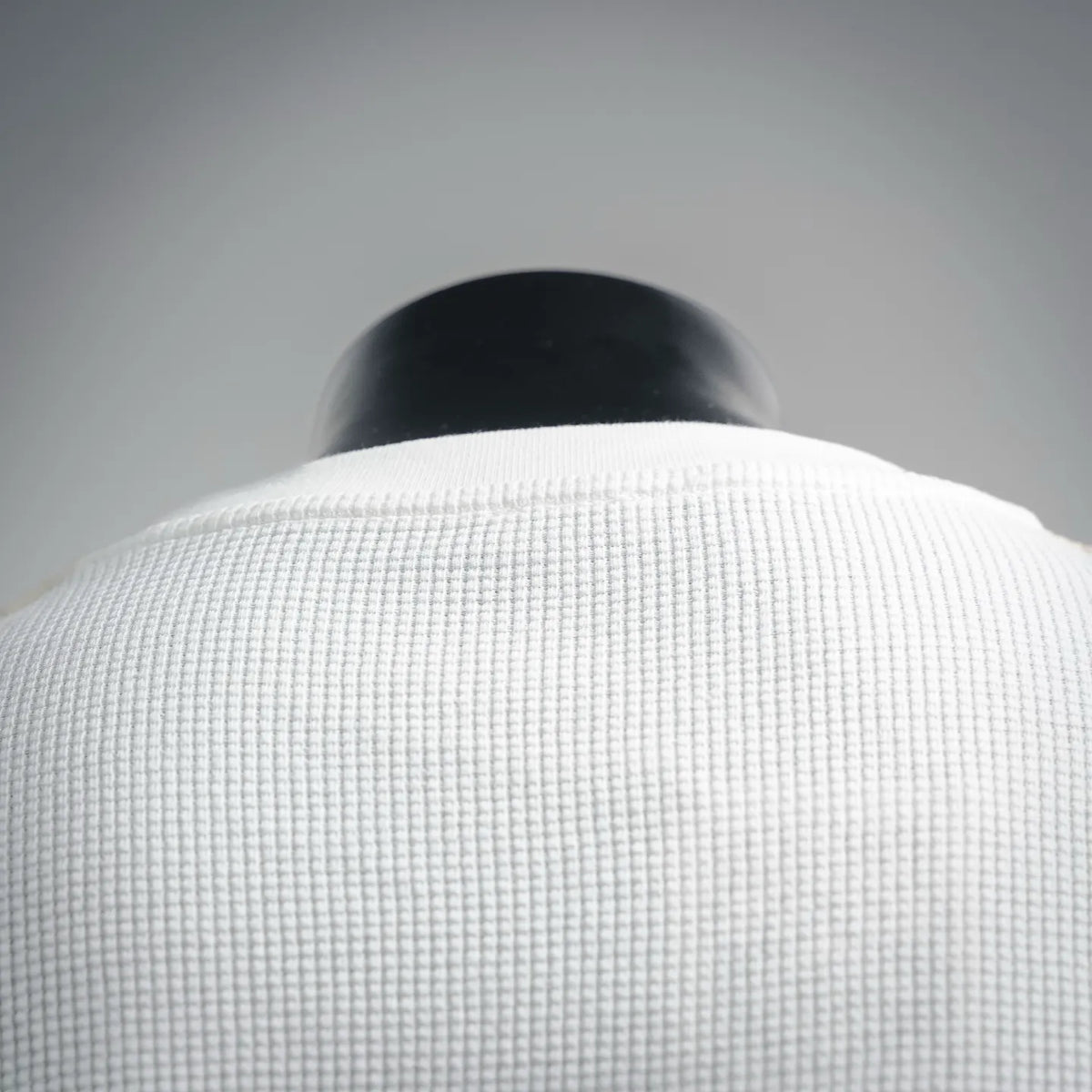 White T-shirt back yoke and neckline close-up