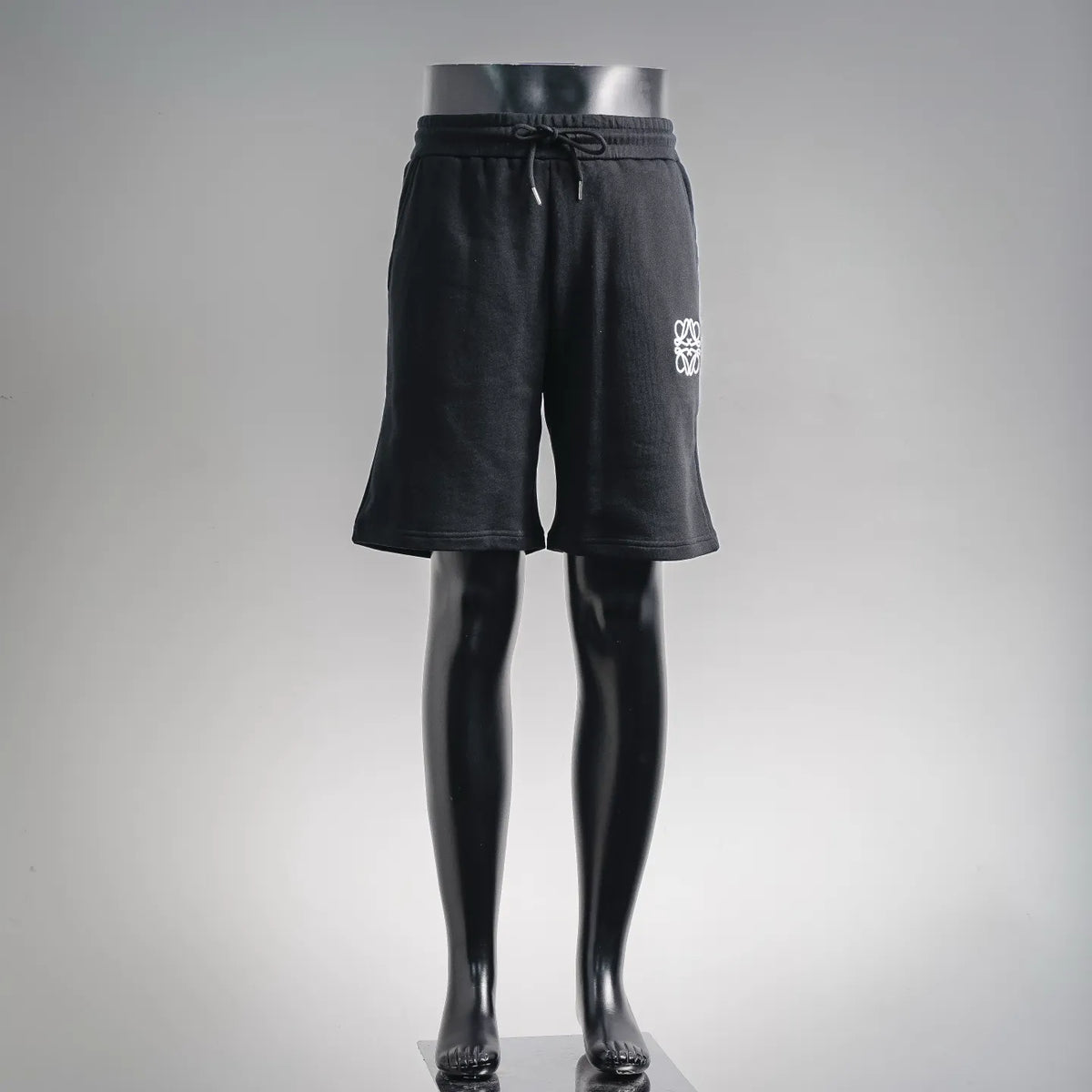 LOEWE black drawstring shorts with elastic waistband and side seam pockets