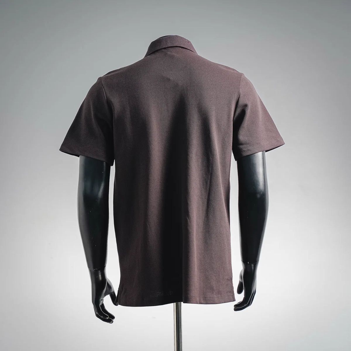 LOEWE short-sleeve polo shirt, back view in dark plum with clean hem and shoulders