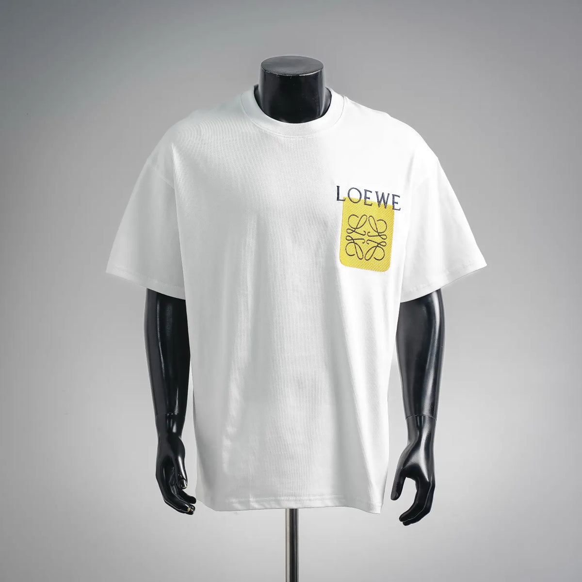 White LOEWE short-sleeve T-shirt with yellow logo patch on the chest