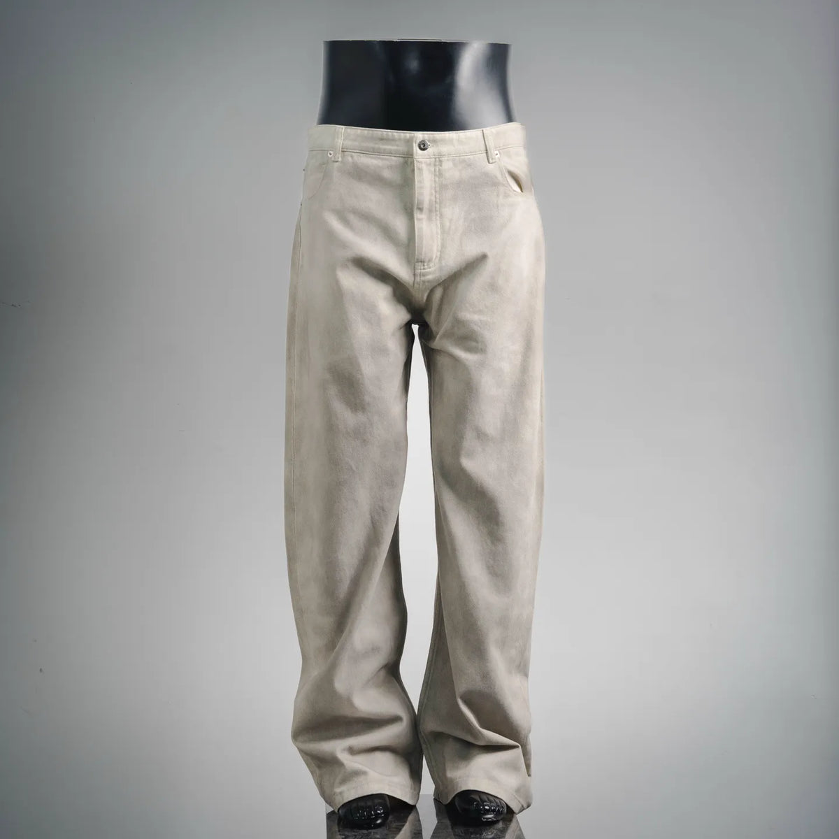 Beige pants with button fly, belt loops, and classic straight legs