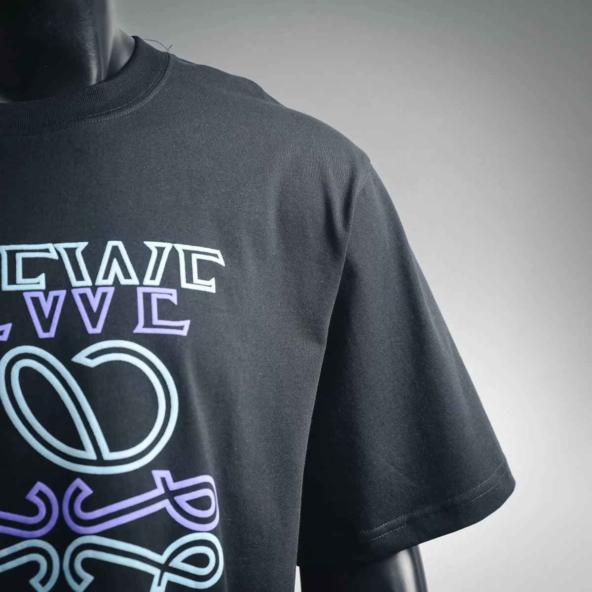 LOEWE black short-sleeve T-shirt with partial colorful graphic near the shoulder