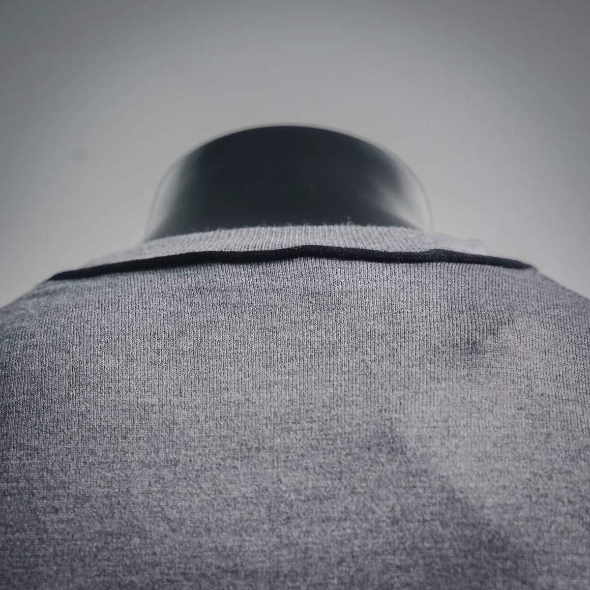 Gray crewneck with black trim collar, knit texture detail