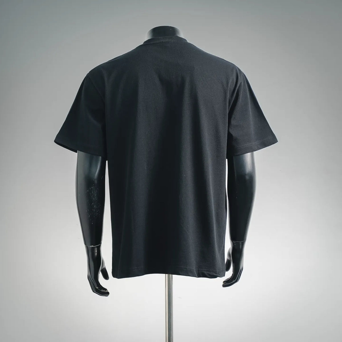 Black LOEWE crew-neck T-shirt, short sleeves, plain back on mannequin.
