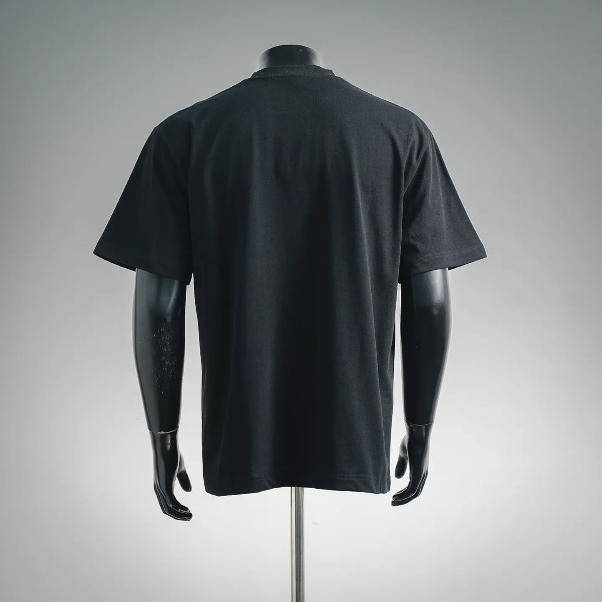 Black short-sleeve T-shirt with plain back on mannequin