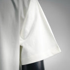 White short-sleeve T-shirt with curved hem and soft drape