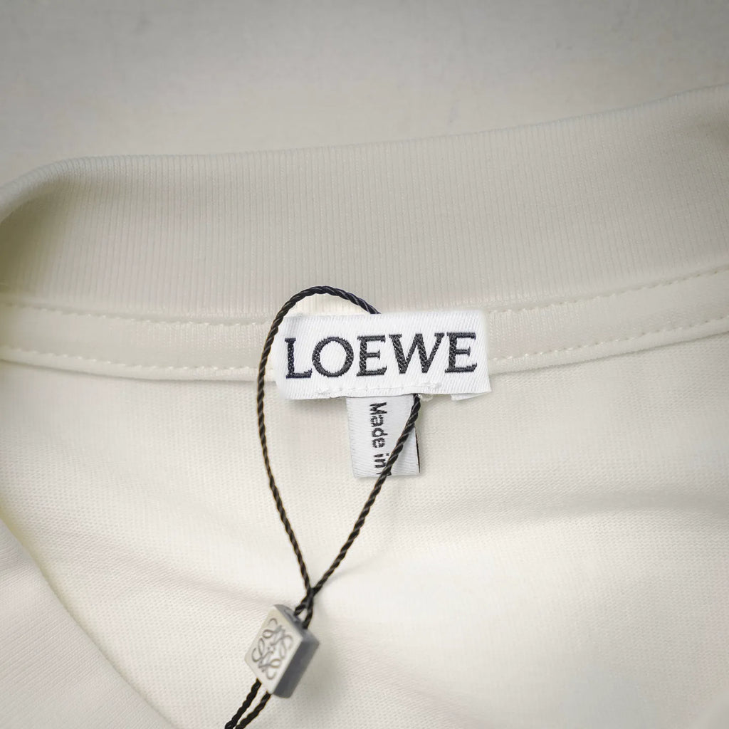 White T-shirt neck label with LOEWE branding and care tag