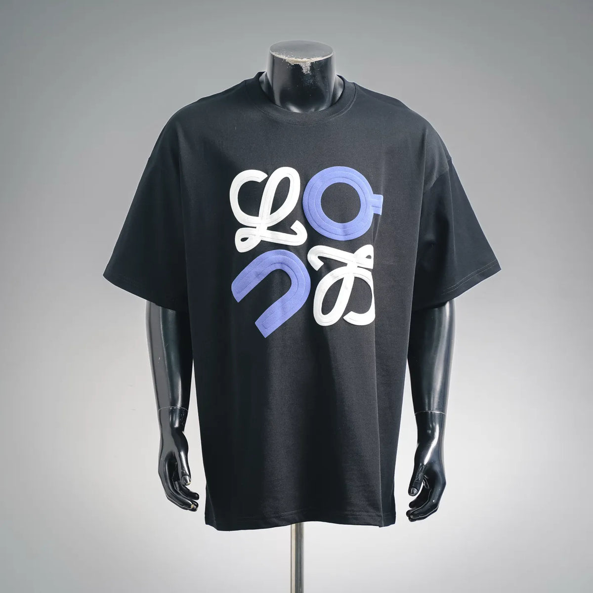 Black short-sleeve T-shirt with LOEWE logo graphic in white and lavender