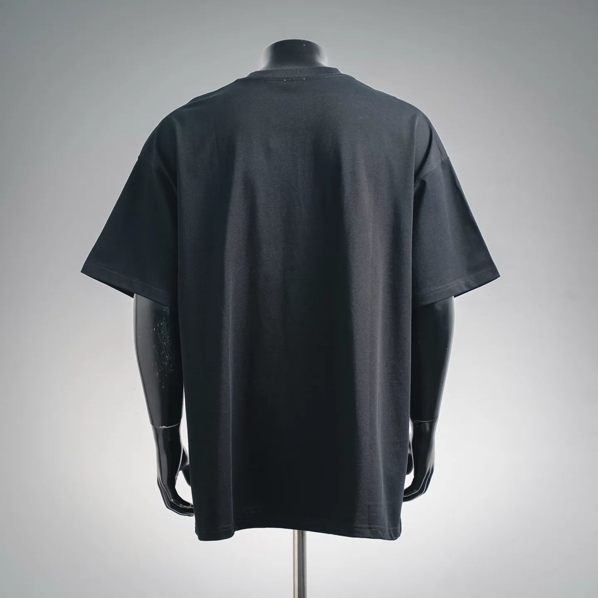 Black short-sleeve T-shirt, back view, smooth plain surface
