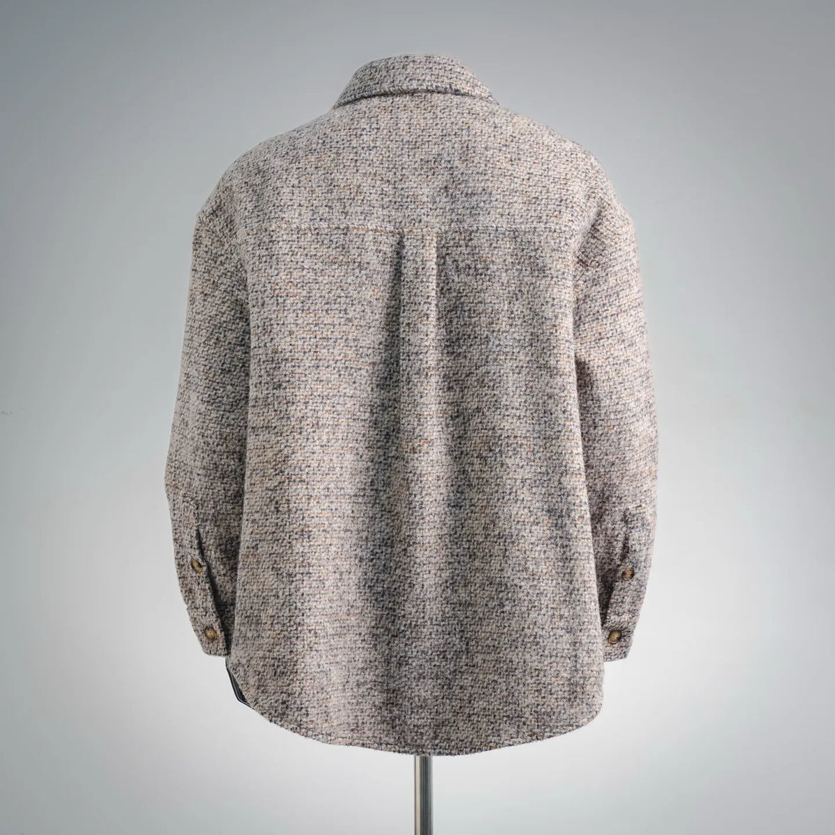 Beige tweed coat, back view with yoke detail and long sleeves.