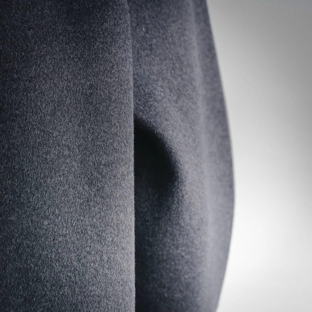 Dark gray wool coat sleeve seam and inner lining