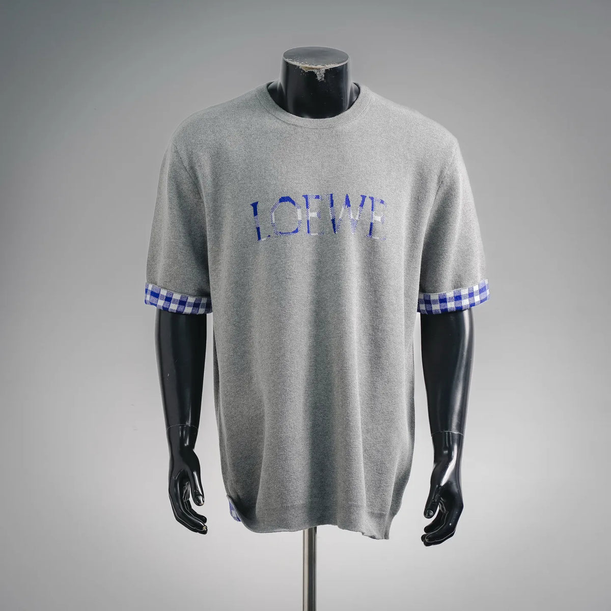 Grey crewneck short-sleeve shirt with blue LOEWE logo and checkered cuff trim
