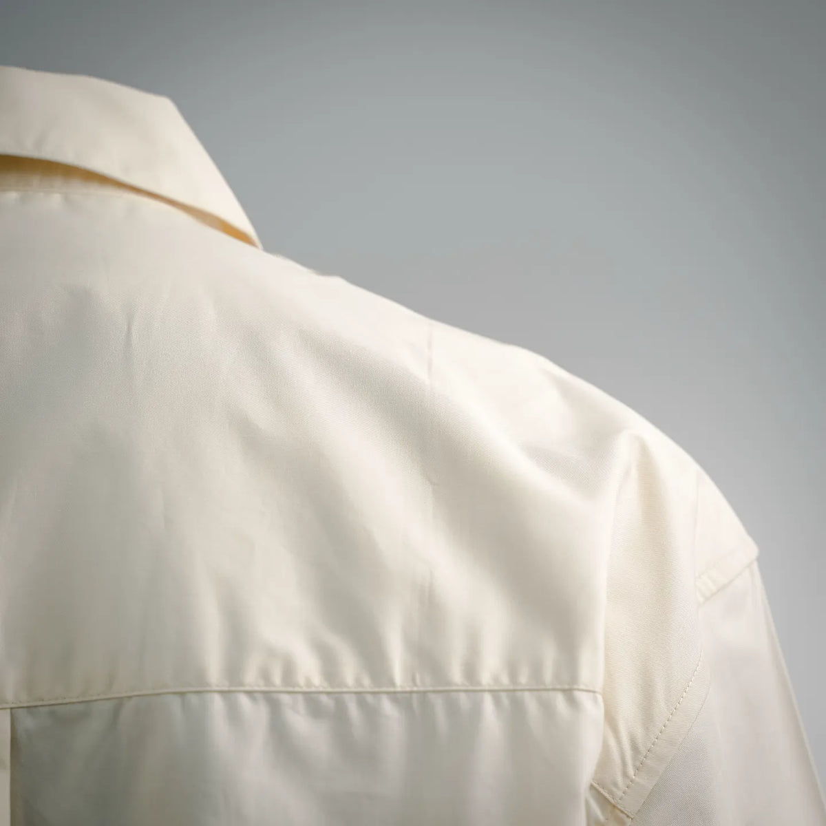 LOEWE off-white button-up shirt shoulder yoke and sleeve seam detail