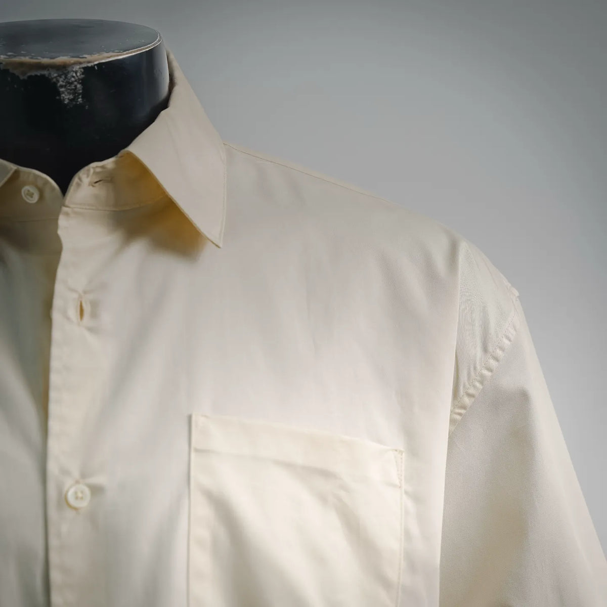 LOEWE off-white button-up shirt collar and front placket detail
