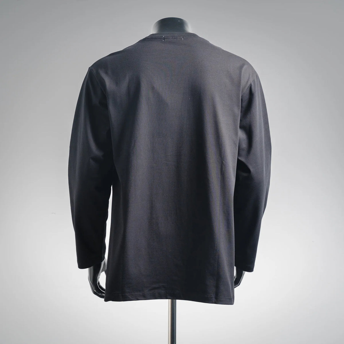 Dark LOEWE long-sleeve crewneck shirt back view on mannequin