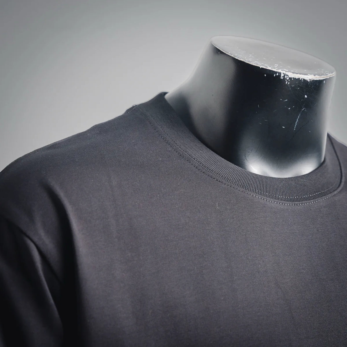 Dark LOEWE crewneck shirt collar and neckline with smooth knit