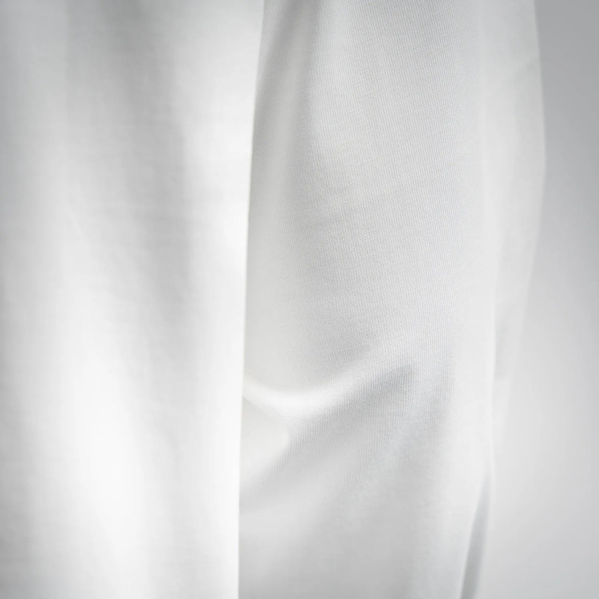 White LOEWE long-sleeve T-shirt fabric close-up