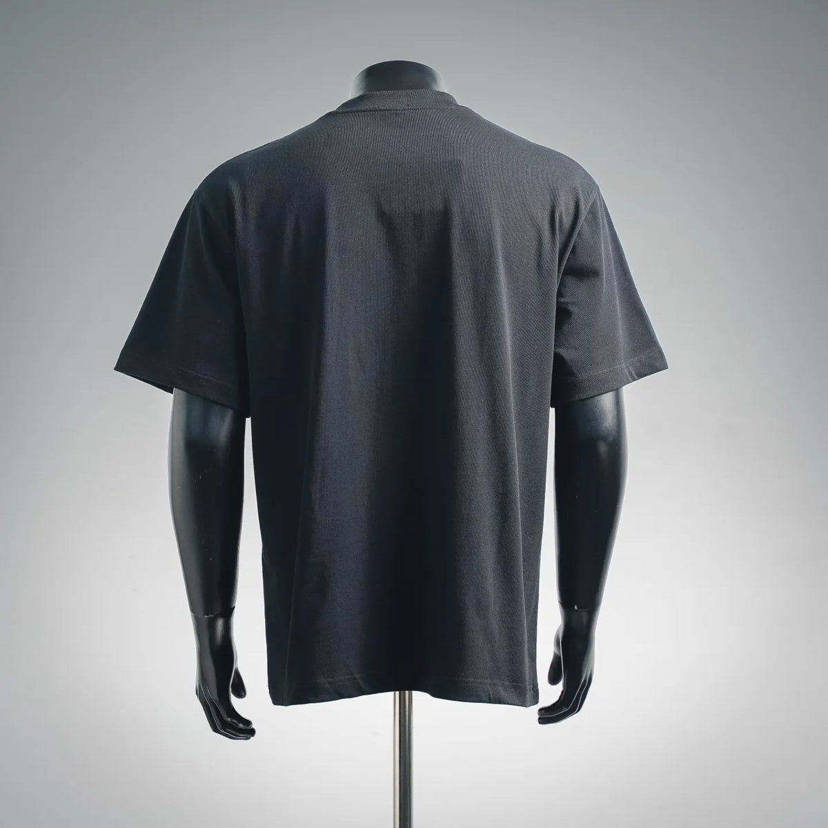 Black short-sleeve T-shirt, back view with plain crew neck