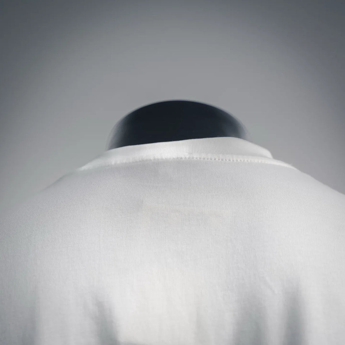 White crew-neck T-shirt collar with ribbed neckline