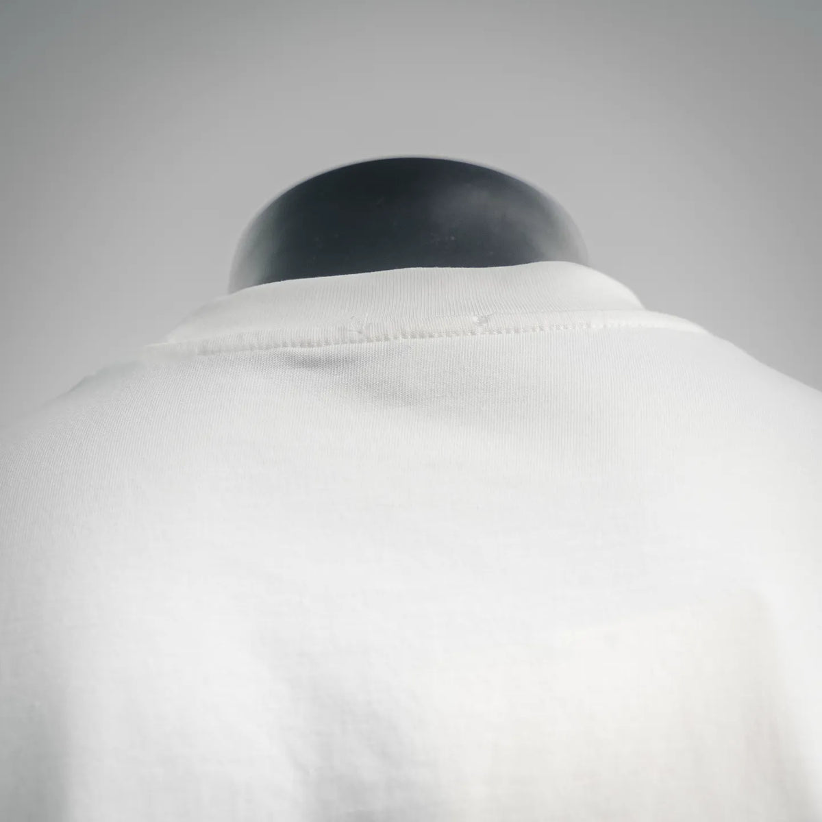 White T-shirt back close-up around the collar