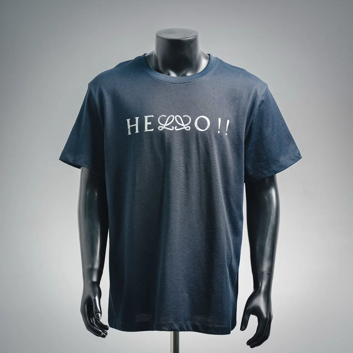 Navy short-sleeve crewneck shirt with white front graphic print