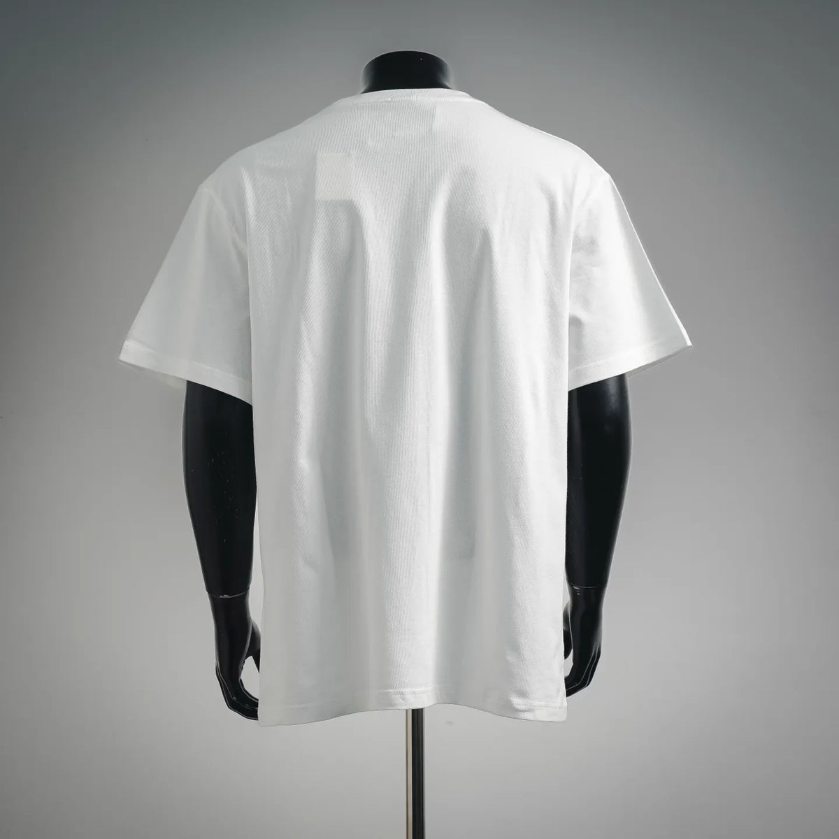 White short-sleeve T-shirt back view on mannequin, plain fabric