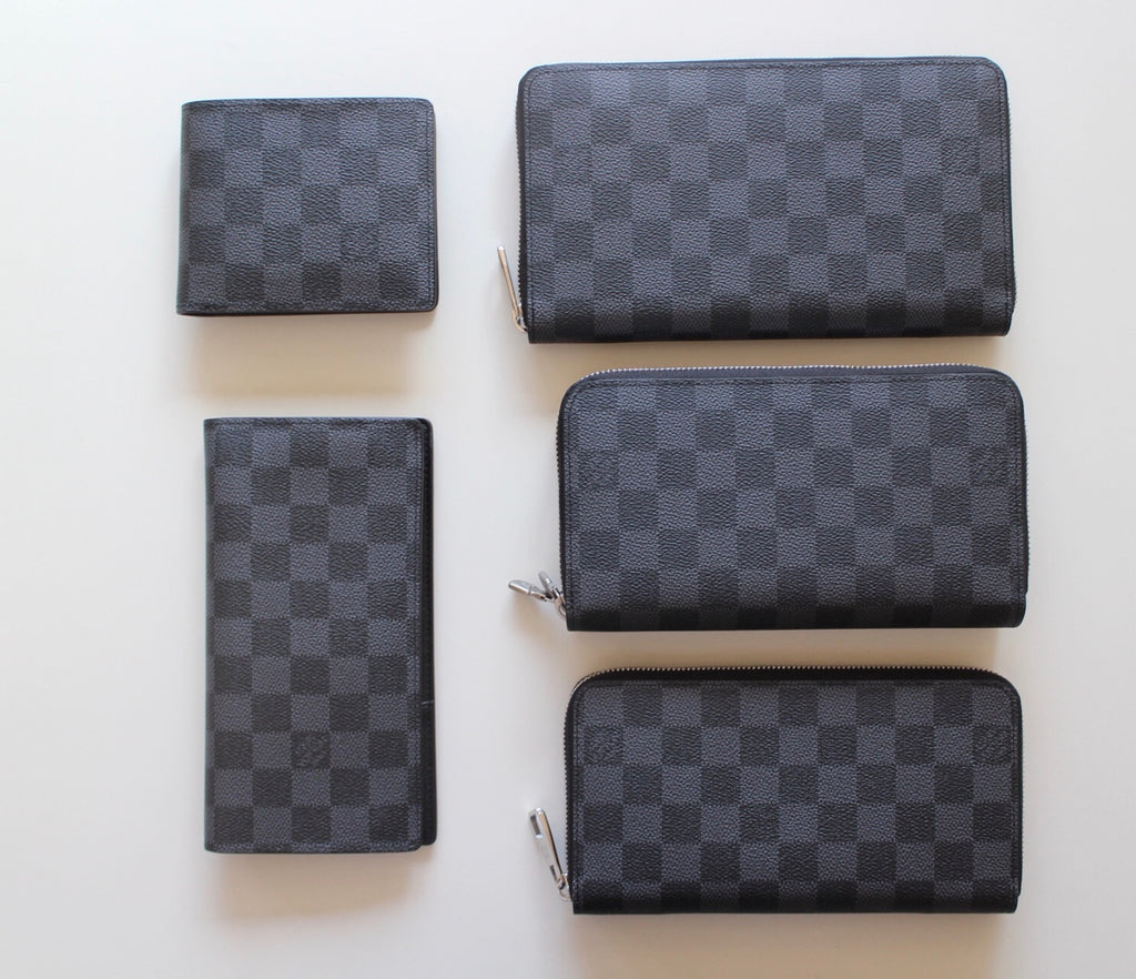 Louis Vuitton small zip wallets in dark checker pattern, set of four