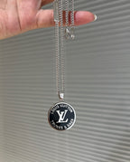 Louis Vuitton round pendant necklace with silver chain and black enamel disk charm