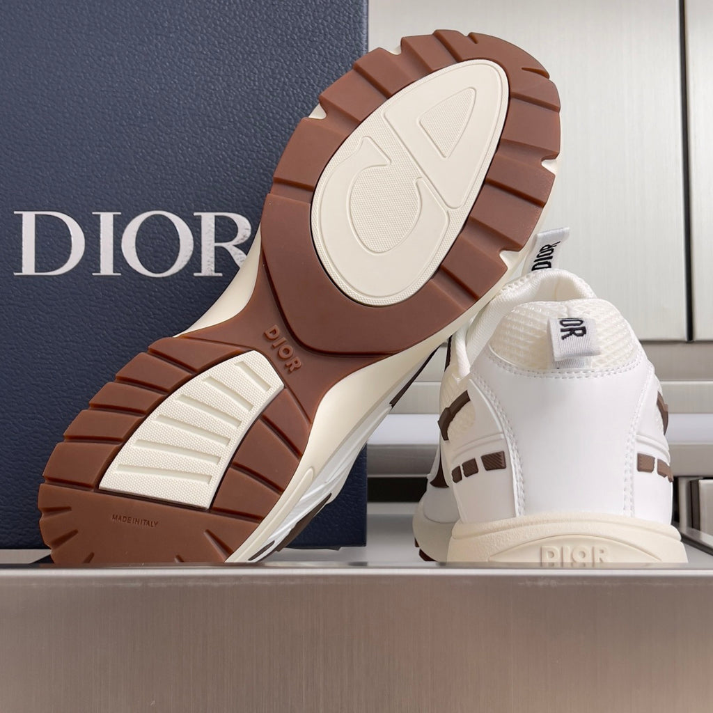 Dior unisex sneaker sole and heel, brown tread with cream outsole and white shoe upper