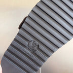 Louis Vuitton logo outsole with ridged rubber tread and embossed V logo