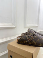 Louis Vuitton monogram slide sandal with two straps and plush faux-fur lining
