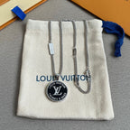 Louis Vuitton accessories pouch with silver chain necklaces and round Trunks & Bags charm